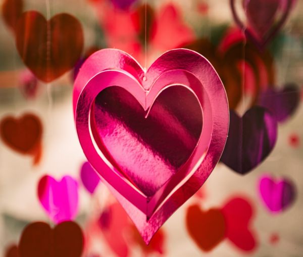 hanging pink hearts made from shiny pink card