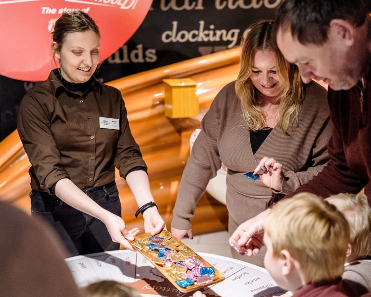 Family taking samples at york chocolate story