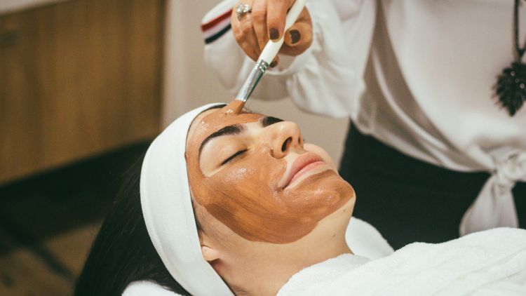 Stock image of a woman having a facial treatment