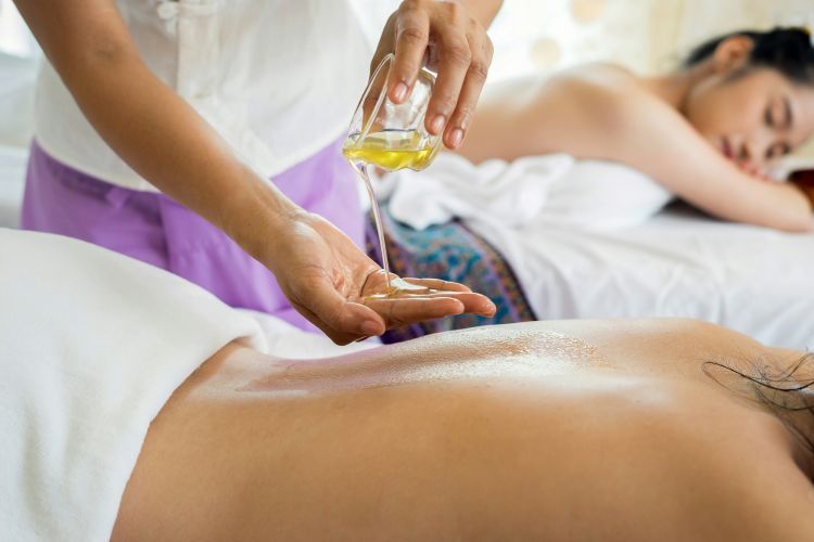 Stock image of two women having a back massage