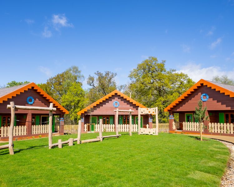 a row of woodland lodges at legoland windsor