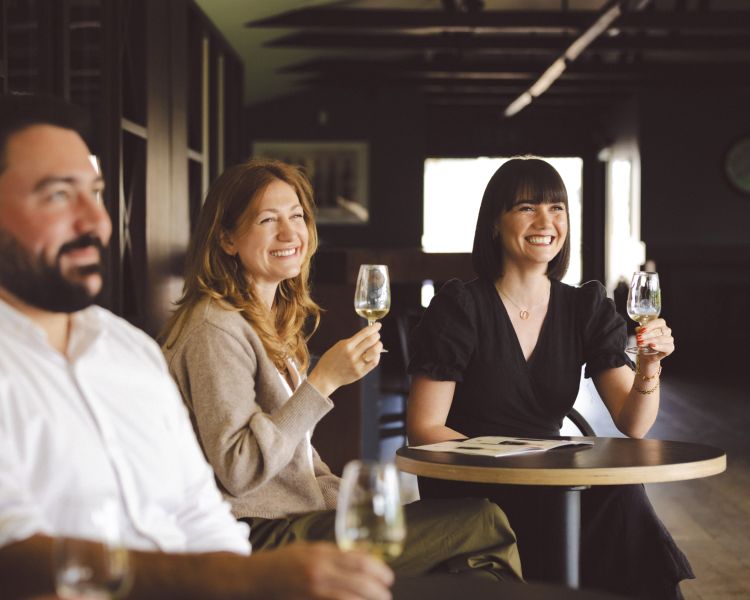 people enjoying wine tasting at chapel down winery