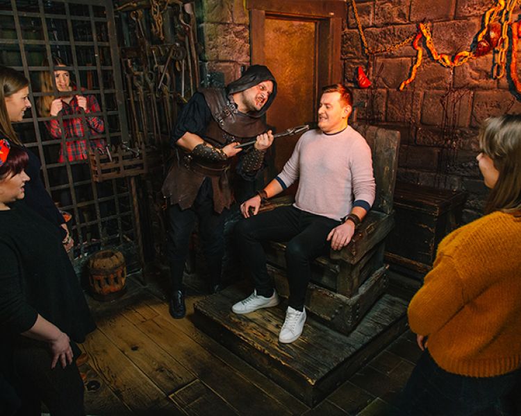 visitors enjoying the london dungeon experience in london
