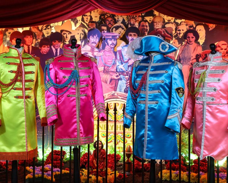 sgt pepper costumes on display at the beatles story museum in liverpool
