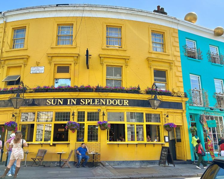 Bright yellow sun in splendor pub in notting hill