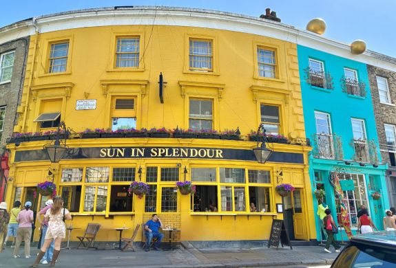 Bright yellow sun in splendor pub in notting hill