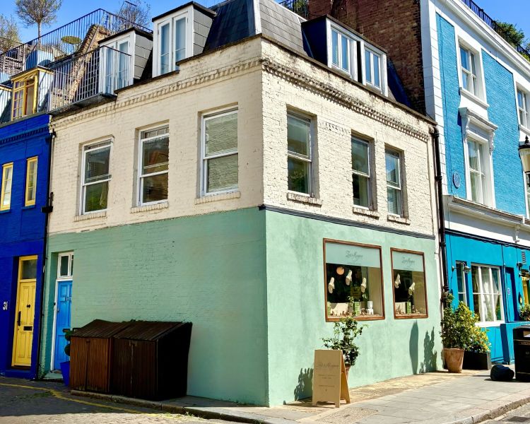 Street corner in notting hill with coloured buildings