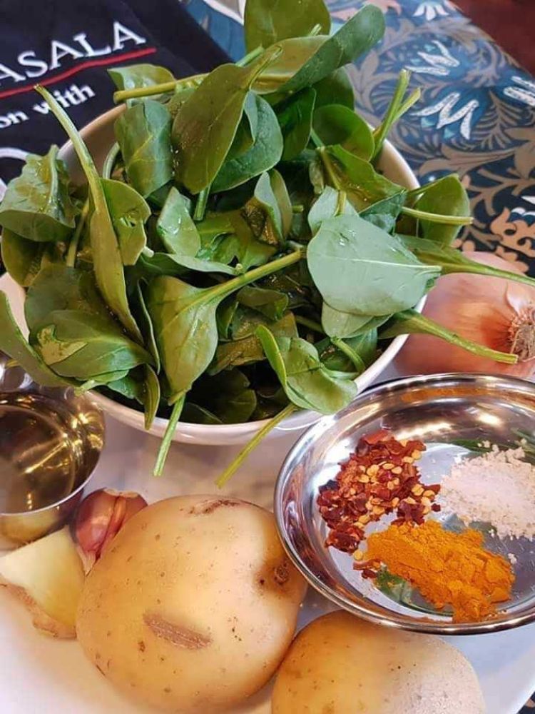 fresh ingredients ready to cook indian food with laina masala