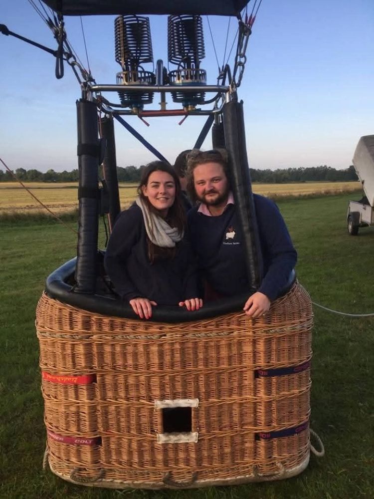 happy customers ready for a balloon flight over the beautiful norfolk countryside