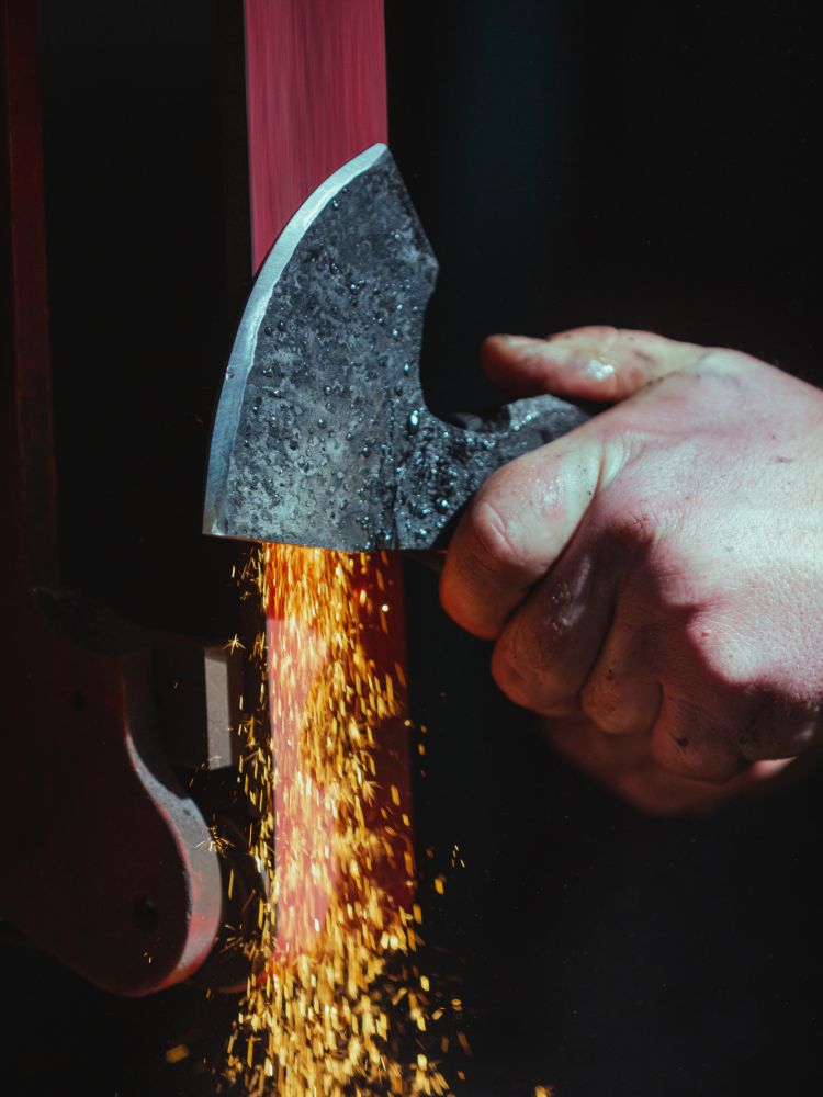axe head being made on blacksmith experience in suffolk
