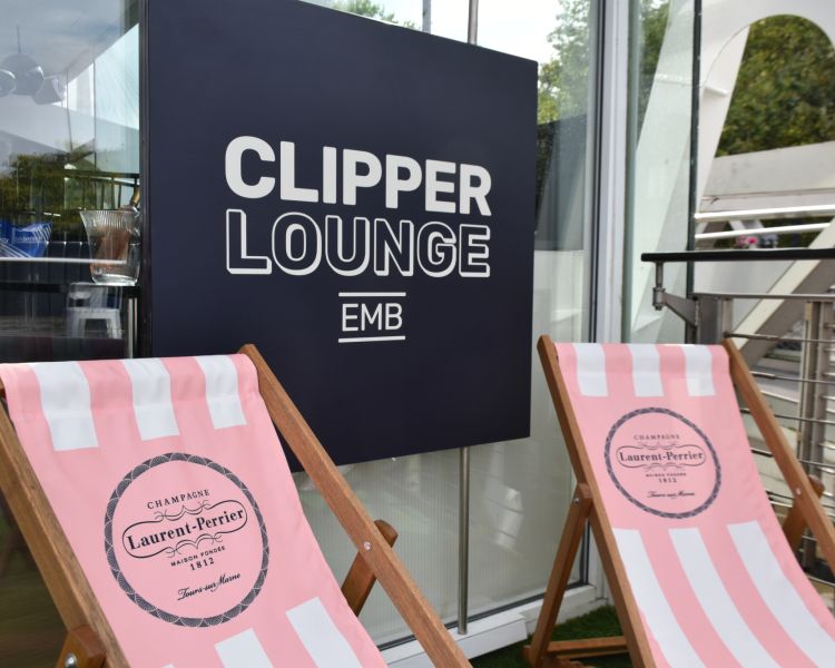 entrance to clipper lounge in london with deckchairs outside