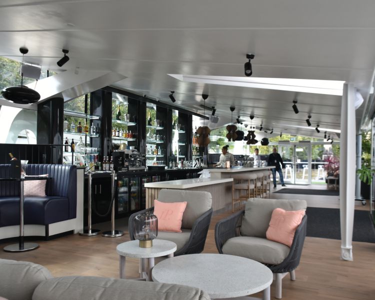 the bar and seating at clipper lounge london