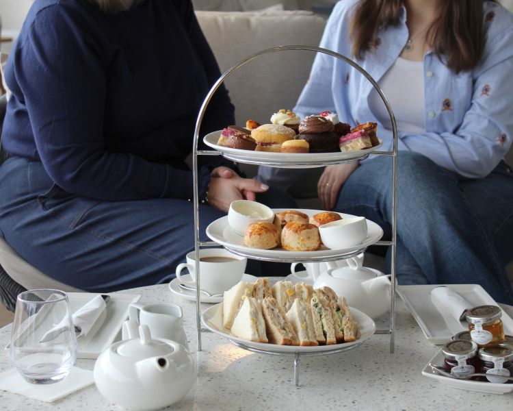 close up of the afternoon tea cake stand at clipper lounge london
