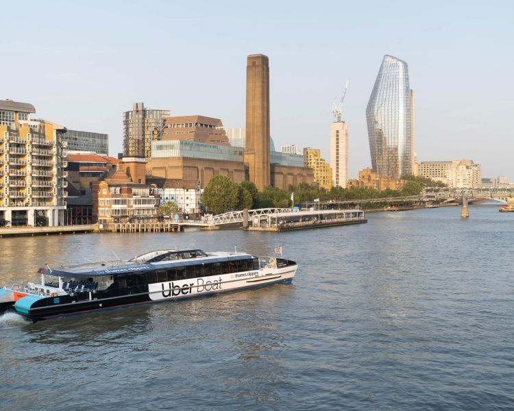 an uber boat on the river thames in london