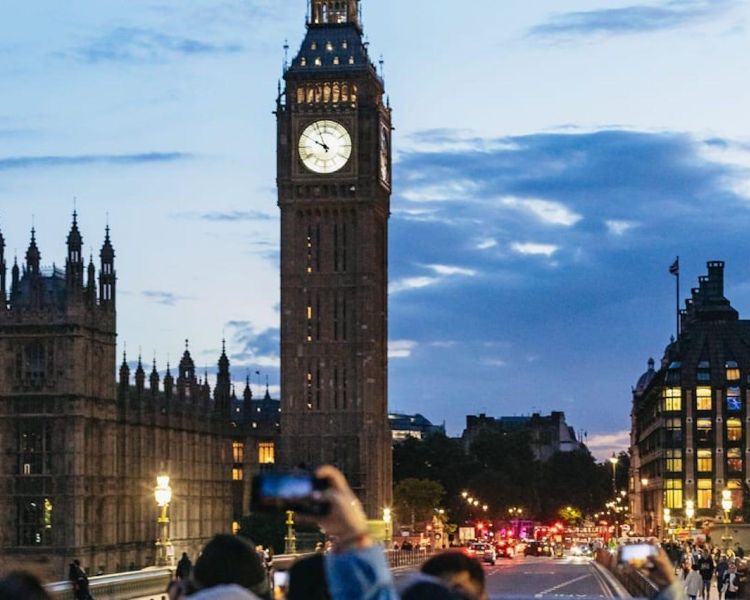 big ben seen from the top deck of the london by night bus tour