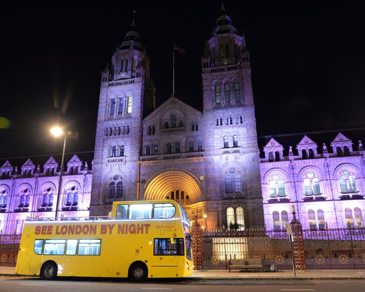 see london by night open topped bus parked up
