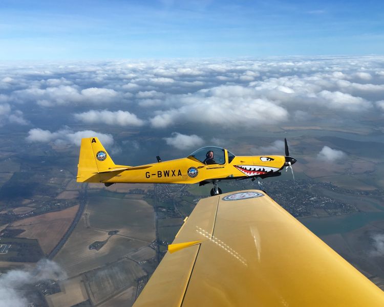 top gun pair view from right aeroplane looking at other plane on top gun flying experience