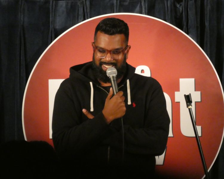 romesh ranganathan performing at the boat show comedy club in london