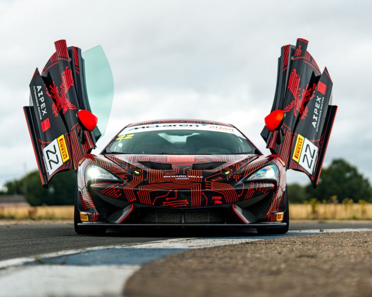mclaren 570S gt4 on track with doors open for a junior driving experience