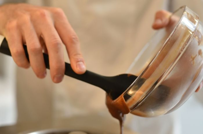 ingredients being poured into a mixer on a make your own gelato from scratch workshop in london