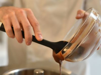 ingredients being poured into a mixer on a make your own gelato from scratch workshop in london
