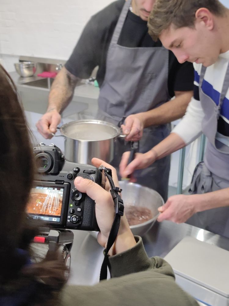people around a bench on a make your own gelato from scratch workshop in london