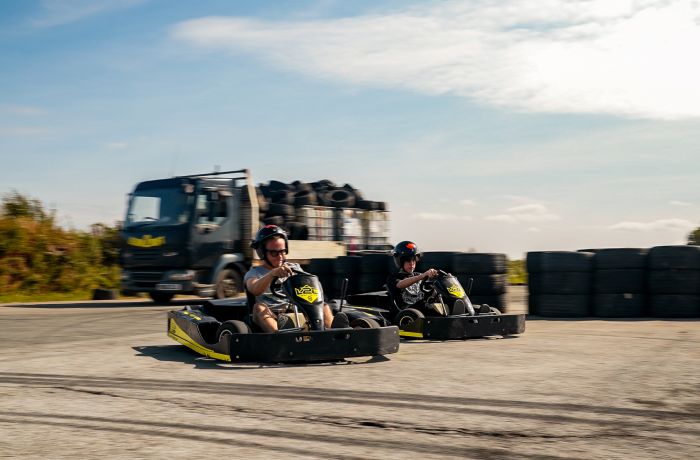 two people on drift karting experience going around track