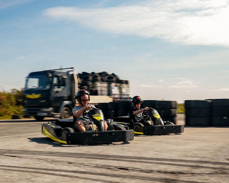 two people on drift karting experience going around track