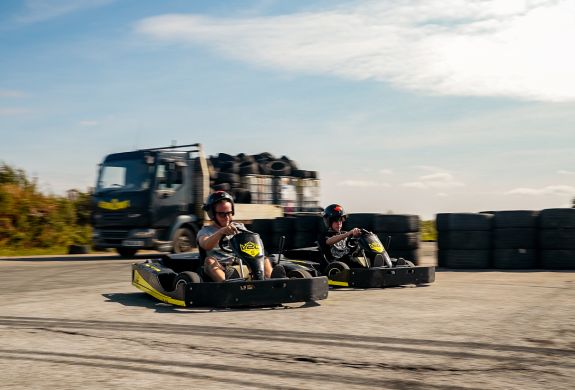 two people on drift karting experience going around track