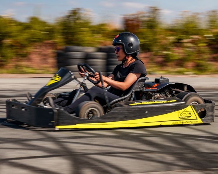 woman on drift karting experience going around track