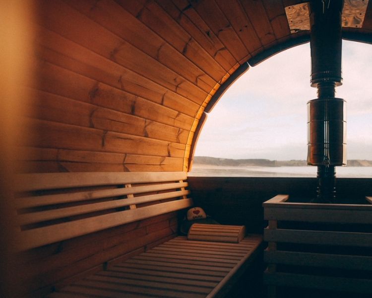 looking out at beach from a sauna pod in wales