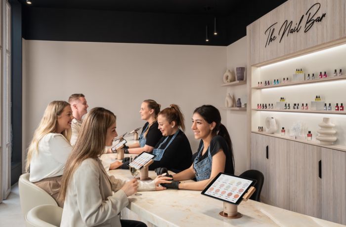 ladies having manicures at a townhouse nail salon in marble arch london
