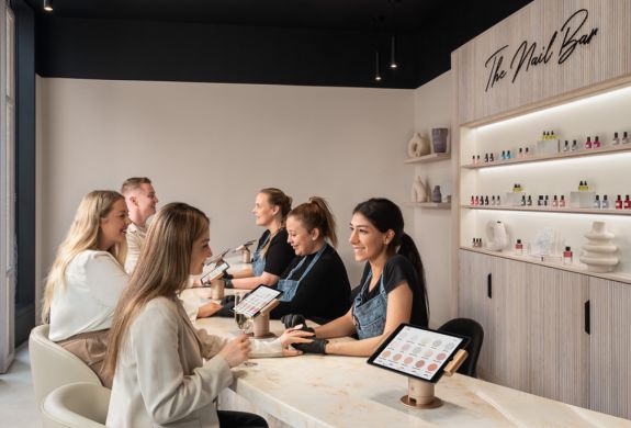 ladies having manicures at a townhouse nail salon in marble arch london
