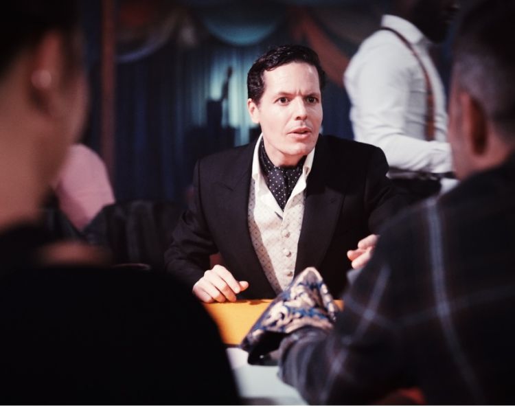 Magician at work at the magicians table show in london