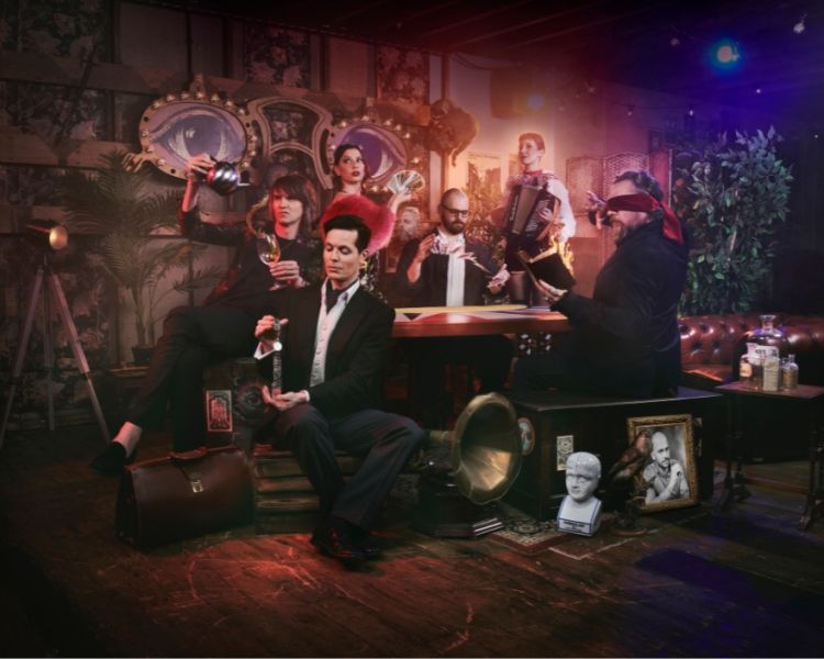 Promotional shot for the magicians table immersive show london