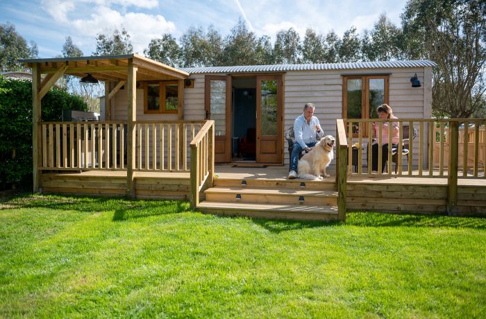 exterior of ensuite shepherd hut at glamping site in dorset