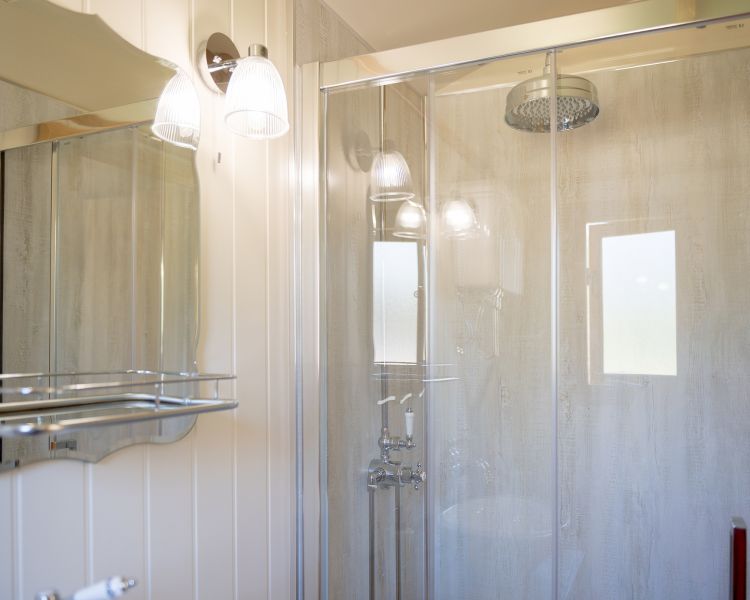 bathroom of ensuite shepherd hut at glamping site in dorset