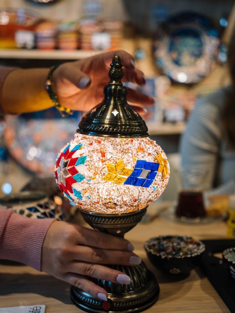 A turkish lamp decorated with colourful mosaics