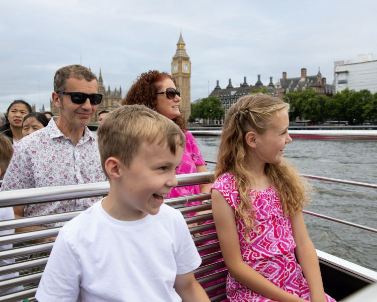 family on london river cruise