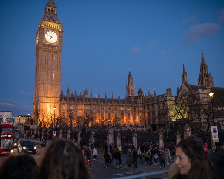 view from top deck of the london night bus tour of houses of parliament