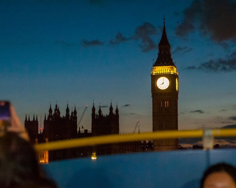 view from top deck of the london night bus tour of big ben