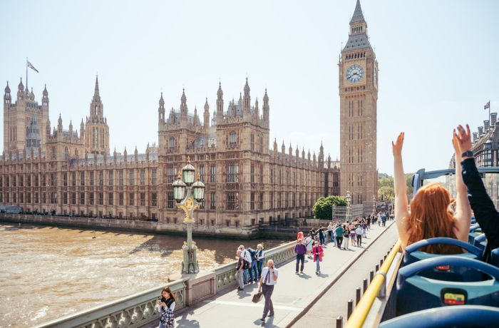 view from top deck of the original london bus tour going past houses of parliament
