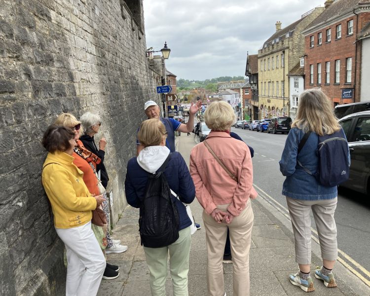 group listening to guide on the arundel historic walking tour