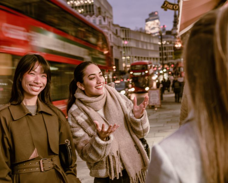Guide talking to group on london pub tour
