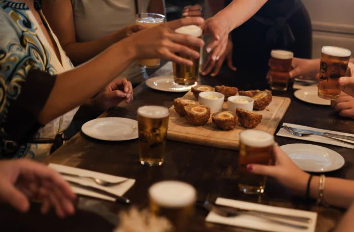Beers and scoth eggs enjoyed on london pub and food tour