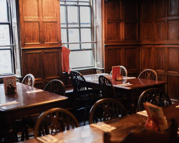 Interior of london pub with wood panelling seen on london pub and food tour