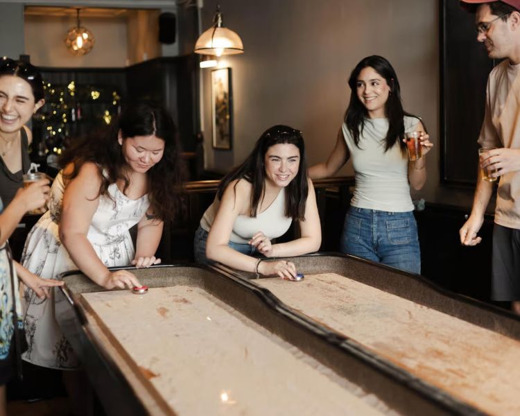 Playing bar games on london pub and food tour