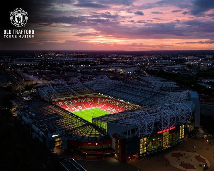 aerial shot of old trafford football ground at night