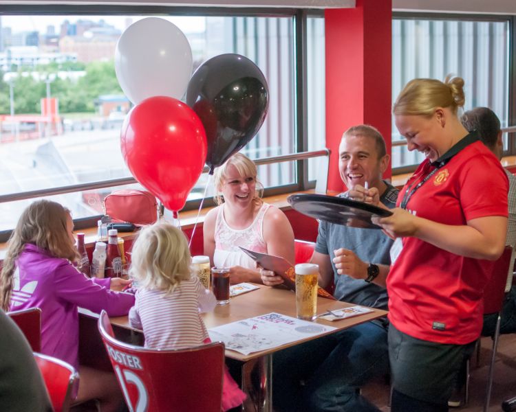 Family at the red cafe at old trafford