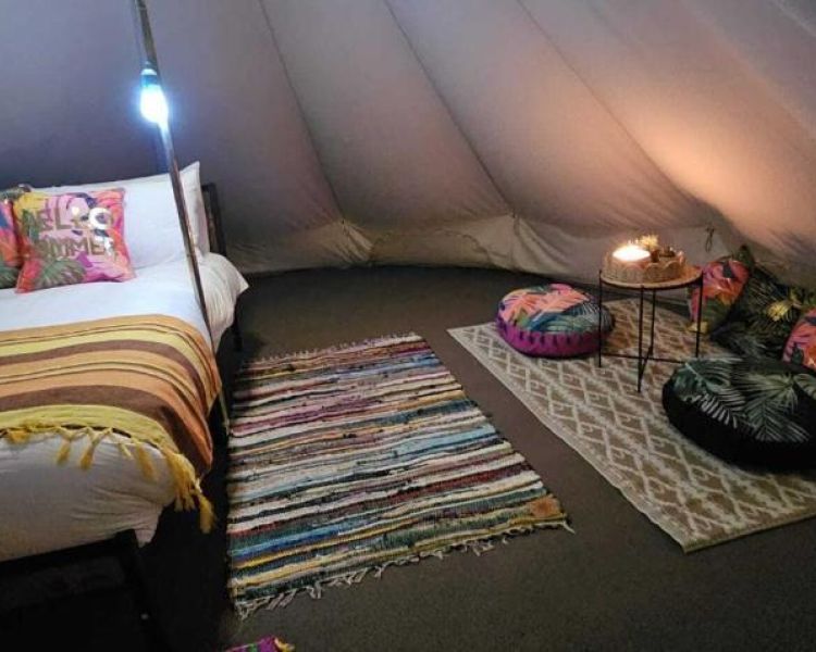 Inside a bell tent for glamping near tonehenge